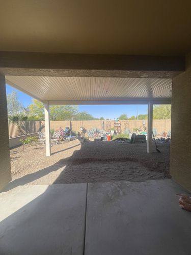 Looking out from under the covered patio before pavers were installed
